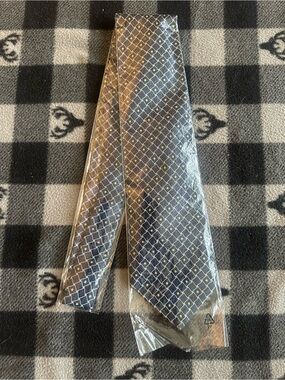 Bulgari Brown Tie with Blue and Cream Geometric Grid